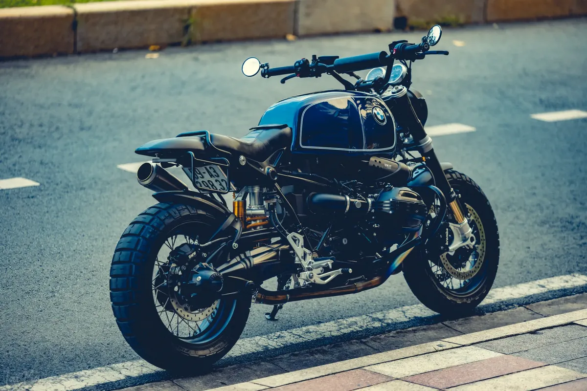 A sleek BMW motorcycle parked on an urban street, showcasing modern design and style.