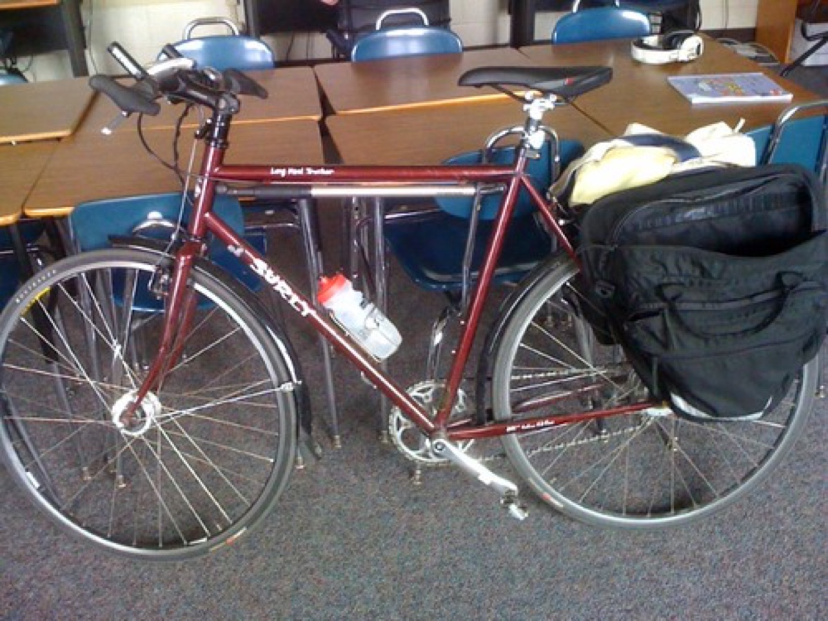 Modern cruiser bike with wide handlebar and relaxed riding posture
